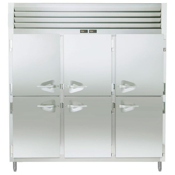 A stainless steel Traulsen refrigerator with white half doors and handles.