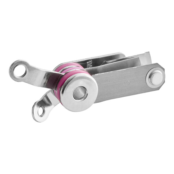 A metallic mechanical component with two flat arms, a central circular section with a pink ring, and a rectangular base, likely part of a safety or temperature control device.