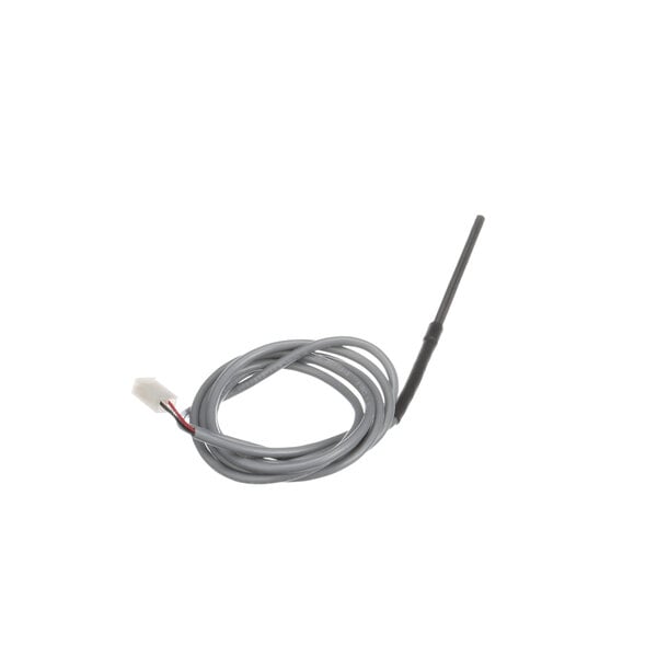 A grey wire with a white connector attached to a Traulsen temperature control.