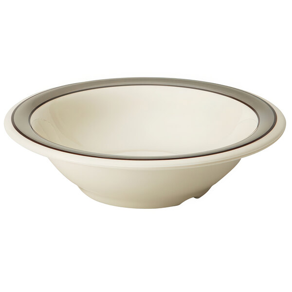 A white bowl with a brown rim.