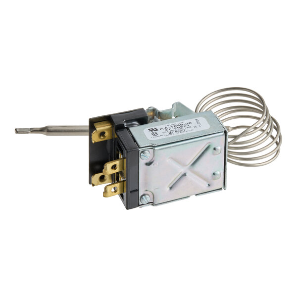 A metal thermostat component with a coiled sensor tube and several electrical terminals.