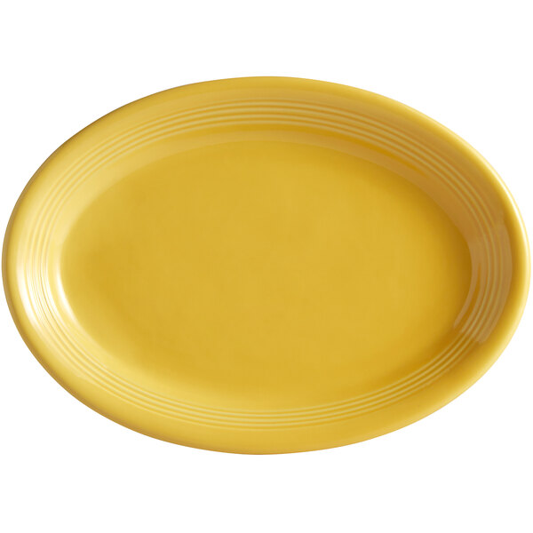 A yellow oval platter with a white border.