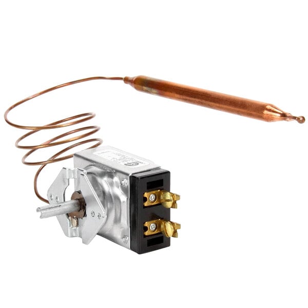 The APW Wyott thermostat, model K-12-24, a small metal device with a copper wire.