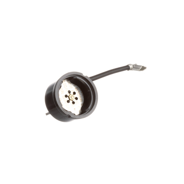 A close-up of a black True Refrigeration Thermo Cut Out Switch with a wire.