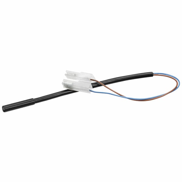 A close-up of white and blue wires connected to a black connector on a Fagor Commercial magnetic switch.