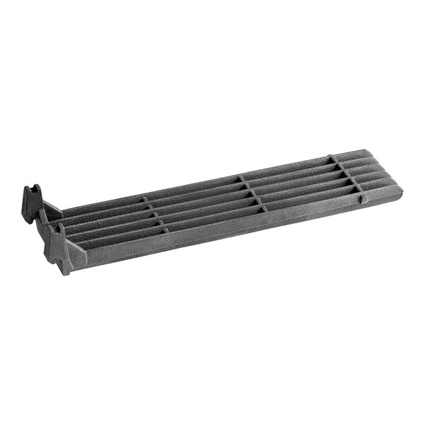 A grey plastic grate with holes.