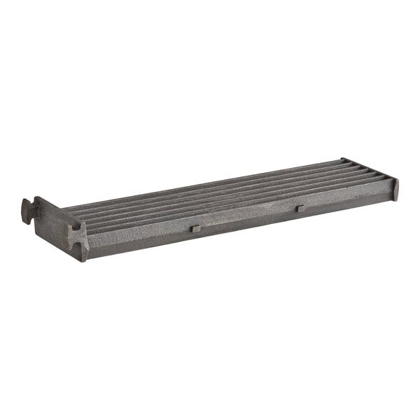 A rectangular, ribbed metal grate with raised edges and a textured surface.