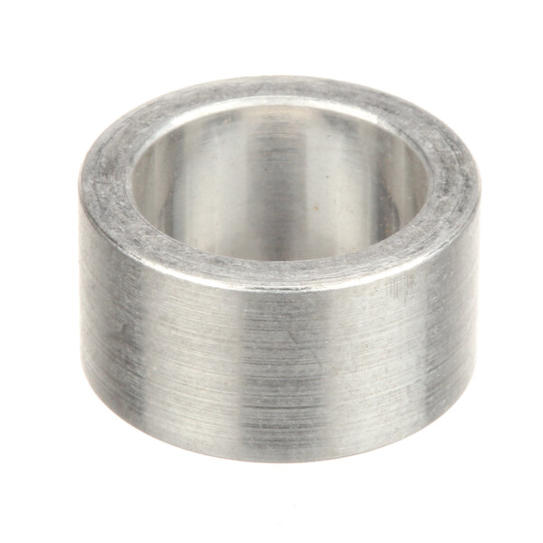 A stainless steel cylindrical spacer.