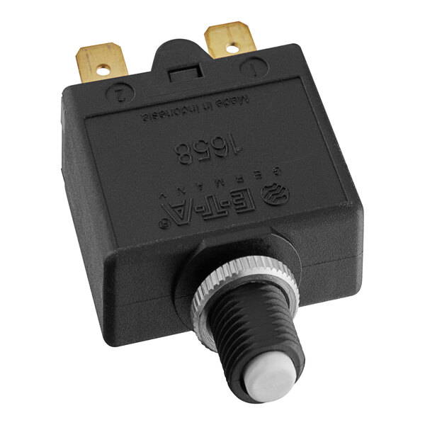 A black plastic Robot Coupe circuit breaker with a white button.