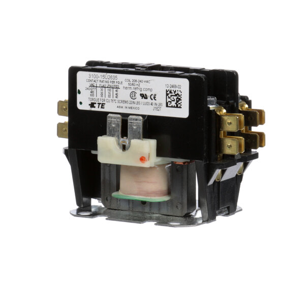 A close-up of a Scotsman Contactor, a small black and white electronic device.