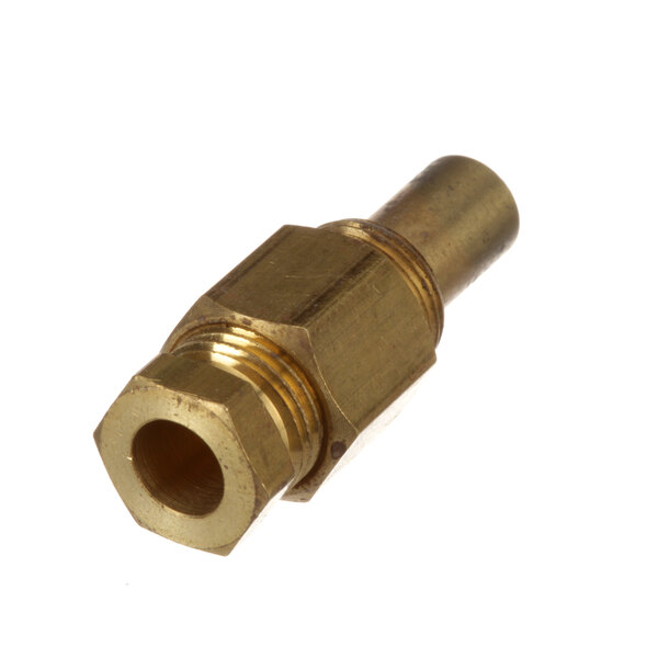 A close-up of a brass nut with a brass threaded hose fitting.