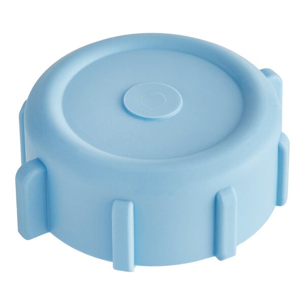 A white background with a blue plastic cap with a round top.