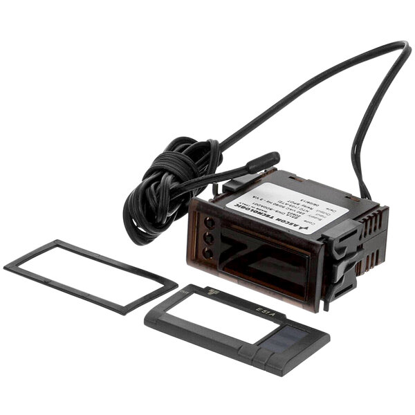 A close-up of a Jet Tech digital temperature display with a cord.