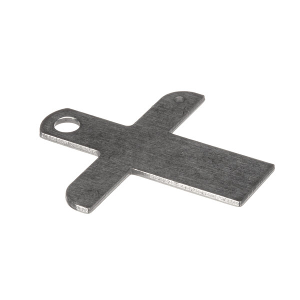 A silver metal cross with a hole in the middle.