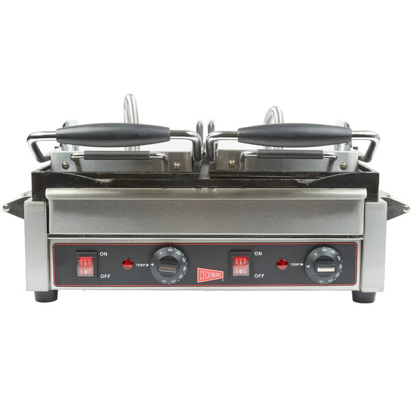 A Cecilware double panini grill with flat surfaces on a counter in a professional kitchen.