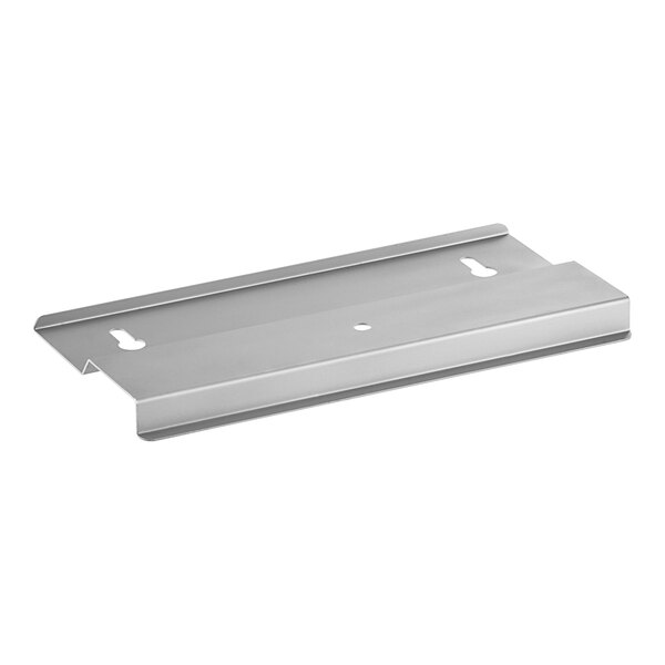 A rectangular metal plate with a hole in the middle.