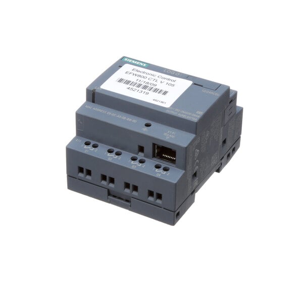 A grey US Range electric control unit with a white label.