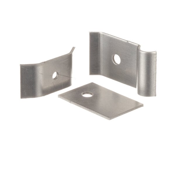 A close-up of a metal clamp with holes.
