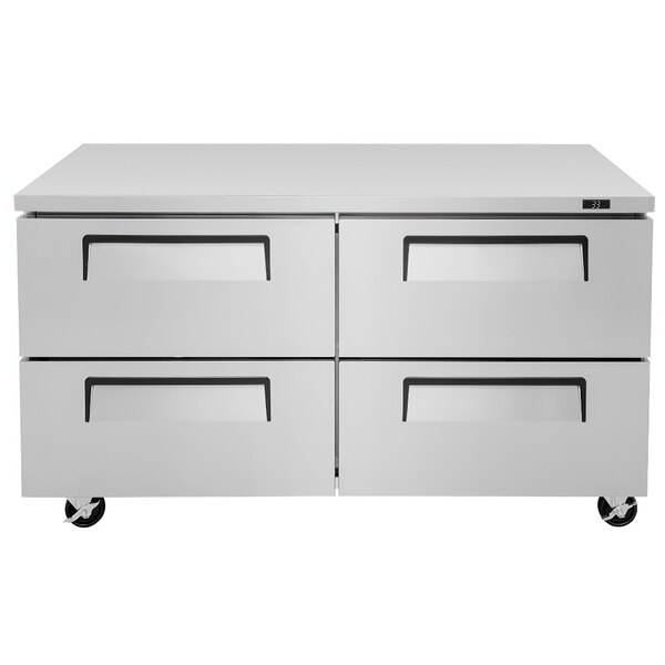 A white Turbo Air undercounter refrigerator with four stainless steel drawers.