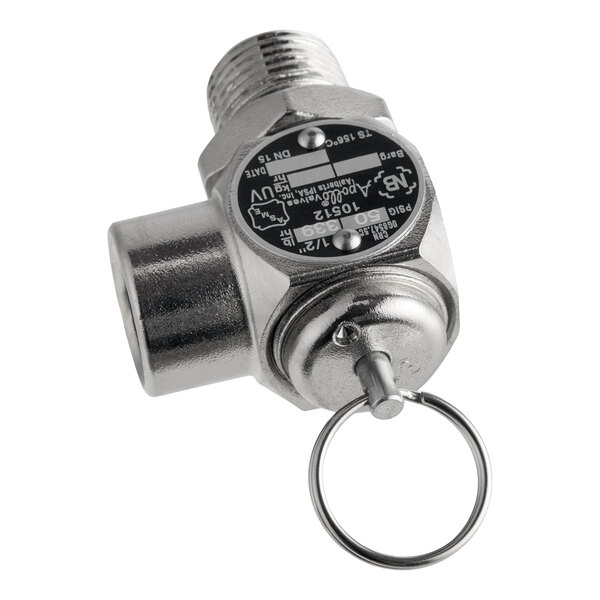 A metallic safety valve with a circular pull ring and threaded connections, featuring a black label with technical specifications.