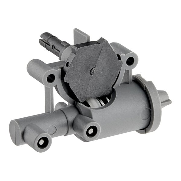 A grey plastic Vulcan rotary ignitor with a black circle.