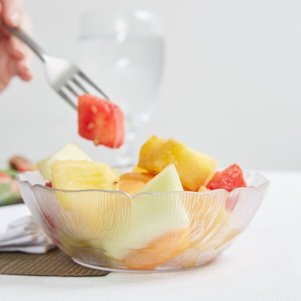 a close up of a bowl of fruit