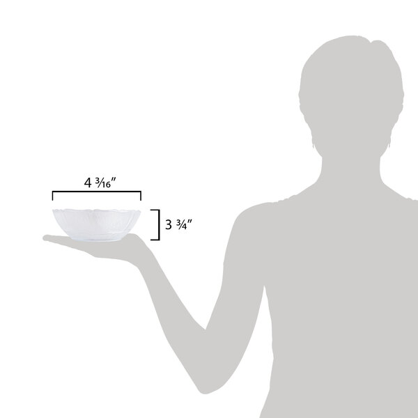 A woman holding a Carlisle Petal Mist clear polycarbonate bowl.