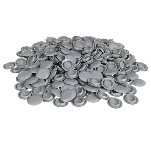 A pile of gray plastic discs.