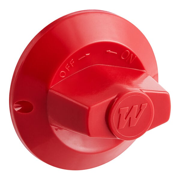 A red plastic Vulcan Hart control knob with a letter on it.