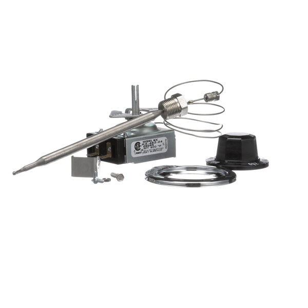 A Henny Penny thermostat assembly on a counter with a screwdriver.