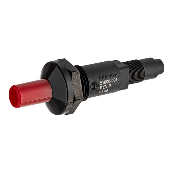 An American Range ignitor kit with a red plastic plug on a black electrical device.