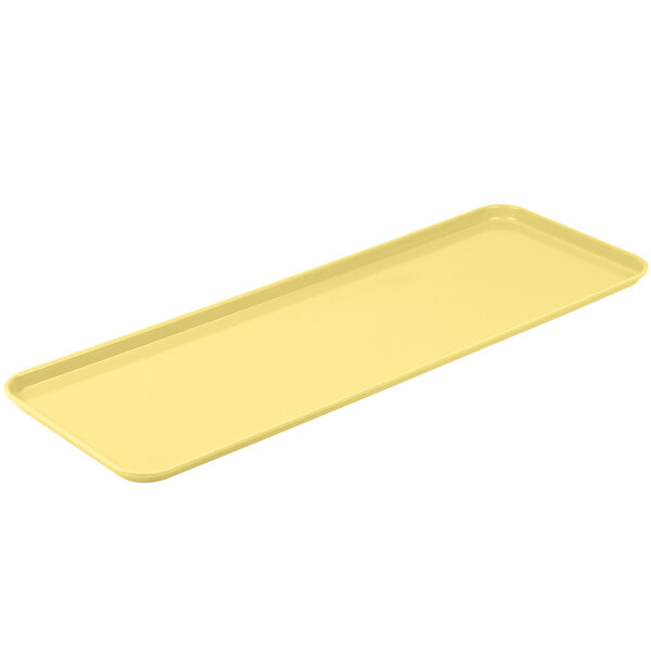 A yellow rectangular Cambro market tray.