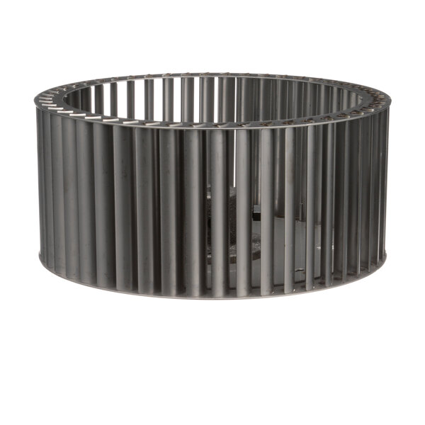 A metal blower wheel with a metal cylinder and a hole in the middle.