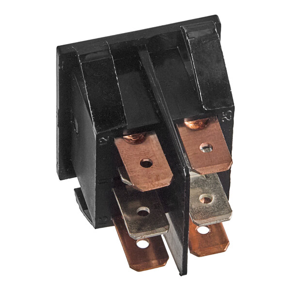 A black and copper Manitowoc Ice rocker switch with metal and copper parts.