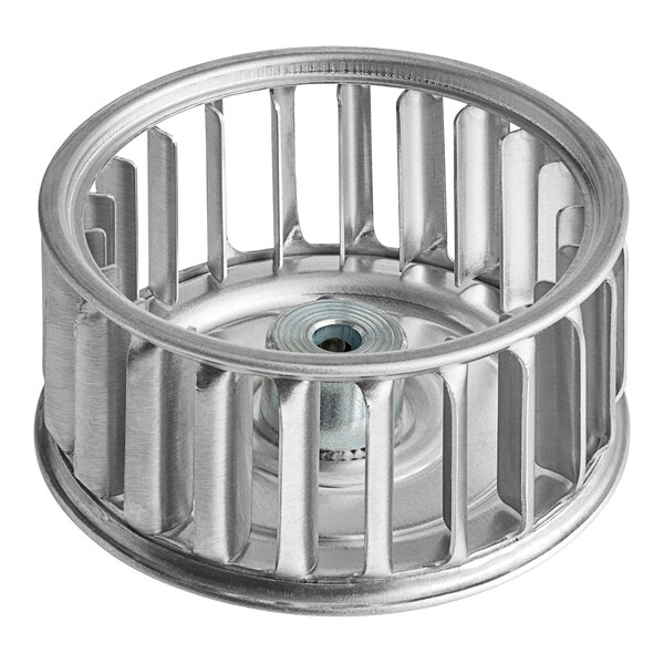 A close-up of a silver metal Henny Penny blower wheel with holes.