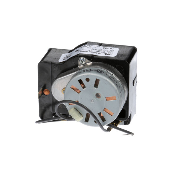 A small electric motor with a round metal disc and wires attached to it.