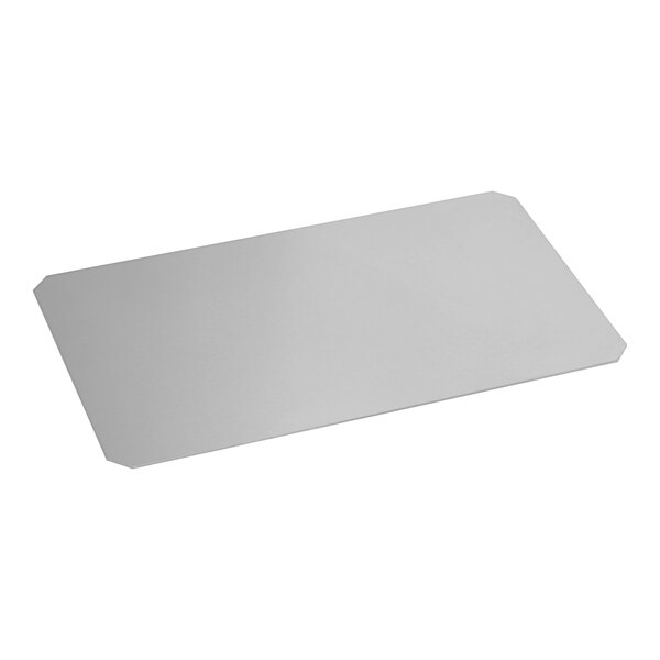 A white rectangular plate with a silver handle.