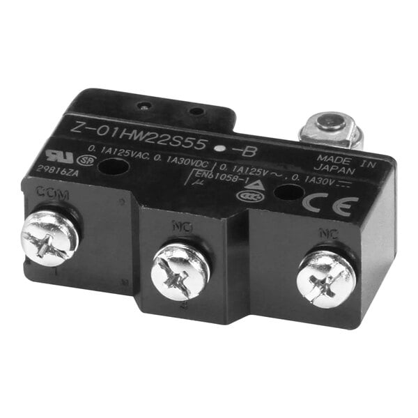 A black electrical device with screws.