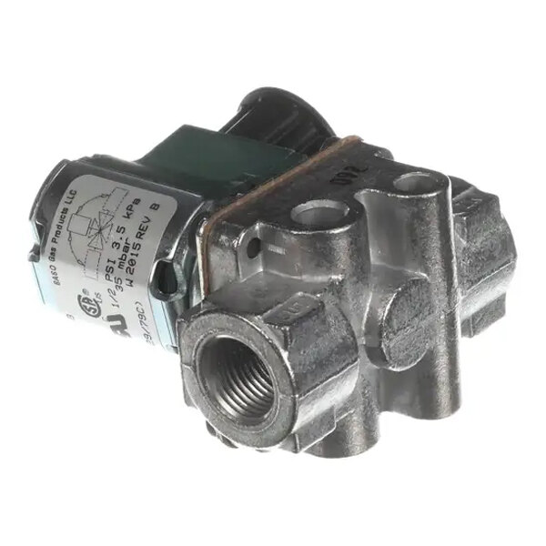 A metallic gas valve component with threaded ports and an attached electrical solenoid, labeled with technical specifications.