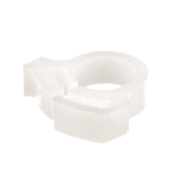 A white plastic ring with a hole.