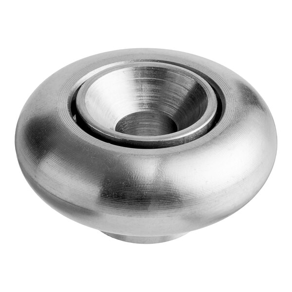 A round silver metal Vulcan roller bearing with a hole in the center.