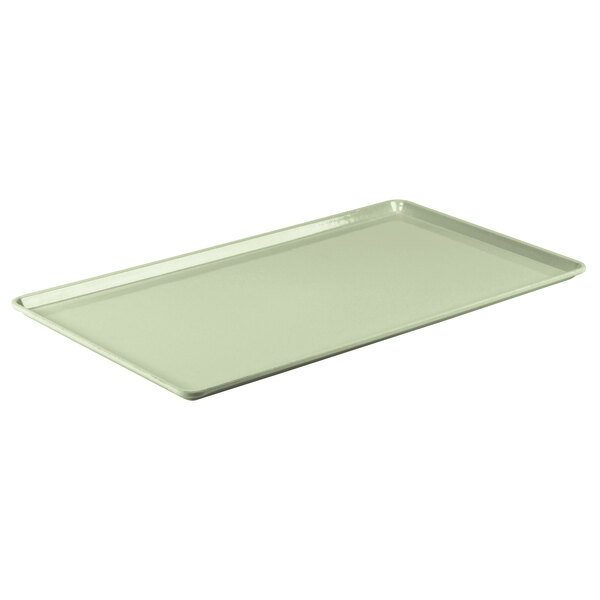 A white rectangular Cambro dietary tray with a Key Lime lid.