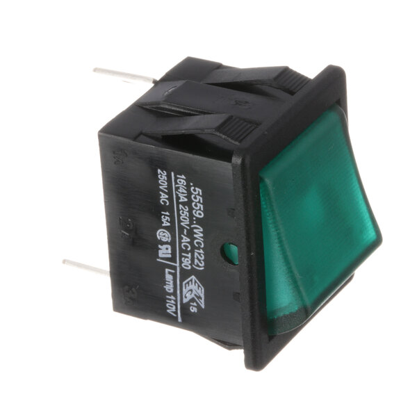 A green light on a black square Wilbur Curtis brew switch.