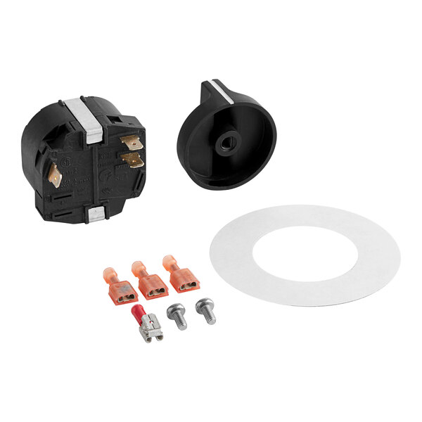 A black and silver electrical device with a round circle and screws on top.