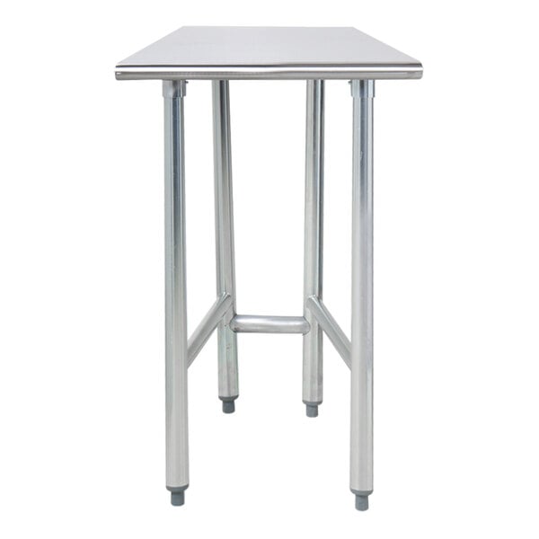 An Advance Tabco stainless steel work table with an open base.
