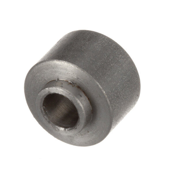 A round metal Cleveland Spacer Vent Cover with a hole in it.