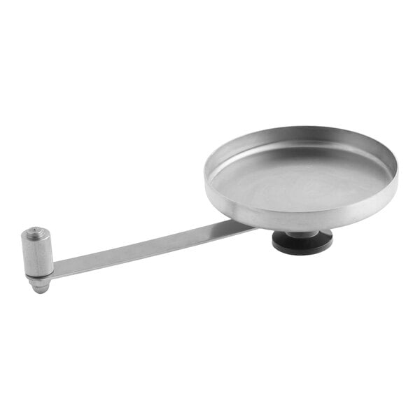 A stainless steel service vent cover assembly for a skillet.
