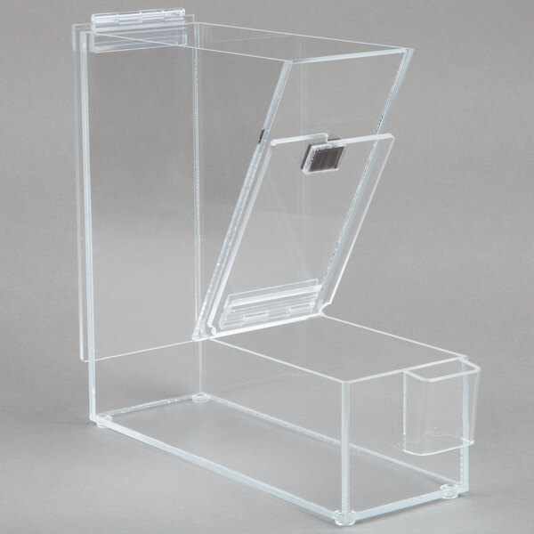 A clear plastic Cal-Mil topping dispenser with a lid.