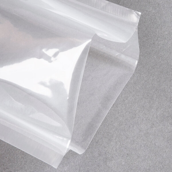An ARY VacMaster chamber vacuum packaging pouch on a clear plastic wrap.