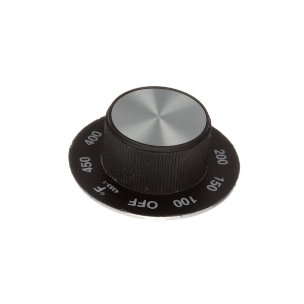 A black and silver Crown Steam dial with a silver background.